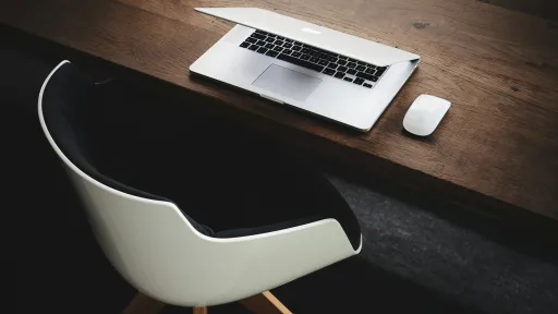 chair and a laptop on the desk